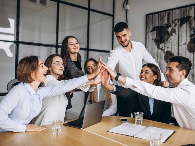 Group of people working out business plan in an office